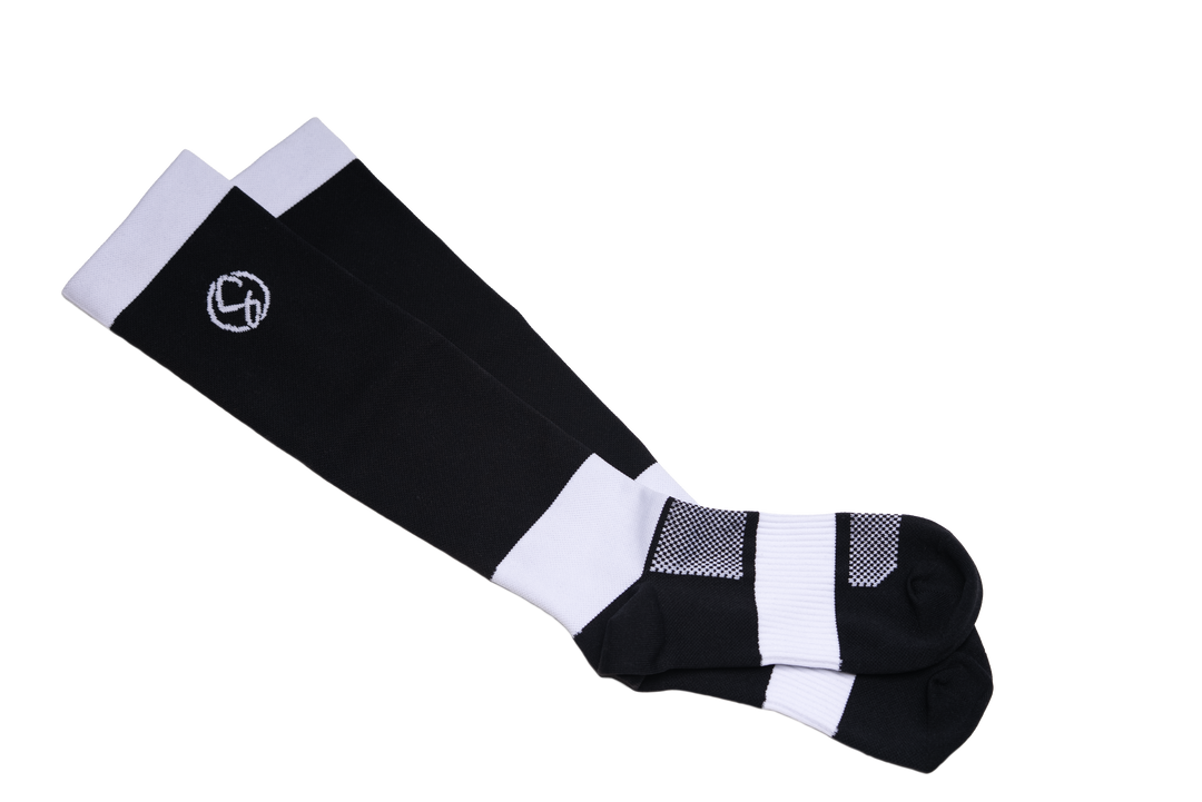 Black and white socks with a logo on a white background